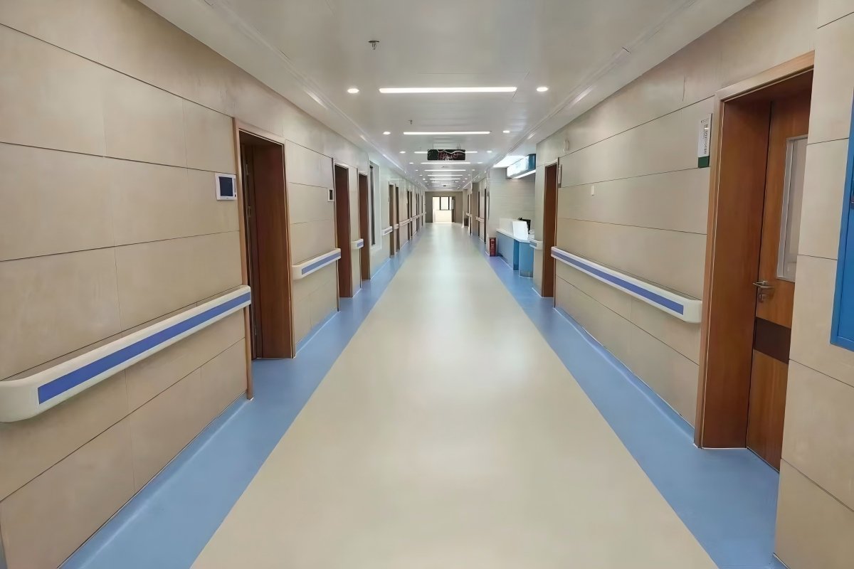 Homogeneous PVC flooring installed in hospital corridor
