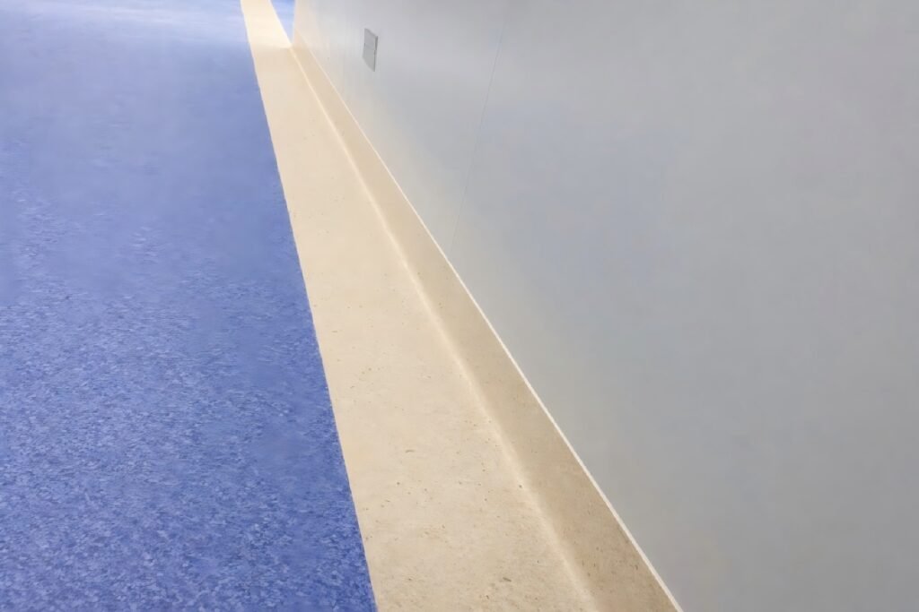 Homogeneous PVC flooring hospital cove base detail