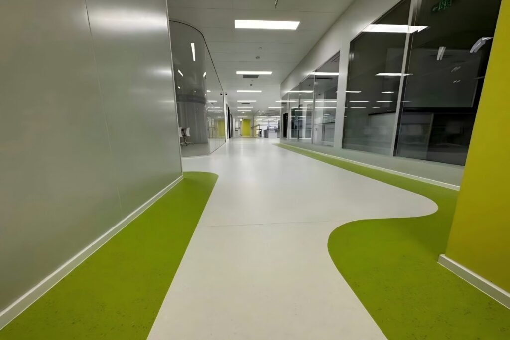 Multi-layer commercial PVC flooring installed in modern corridor
