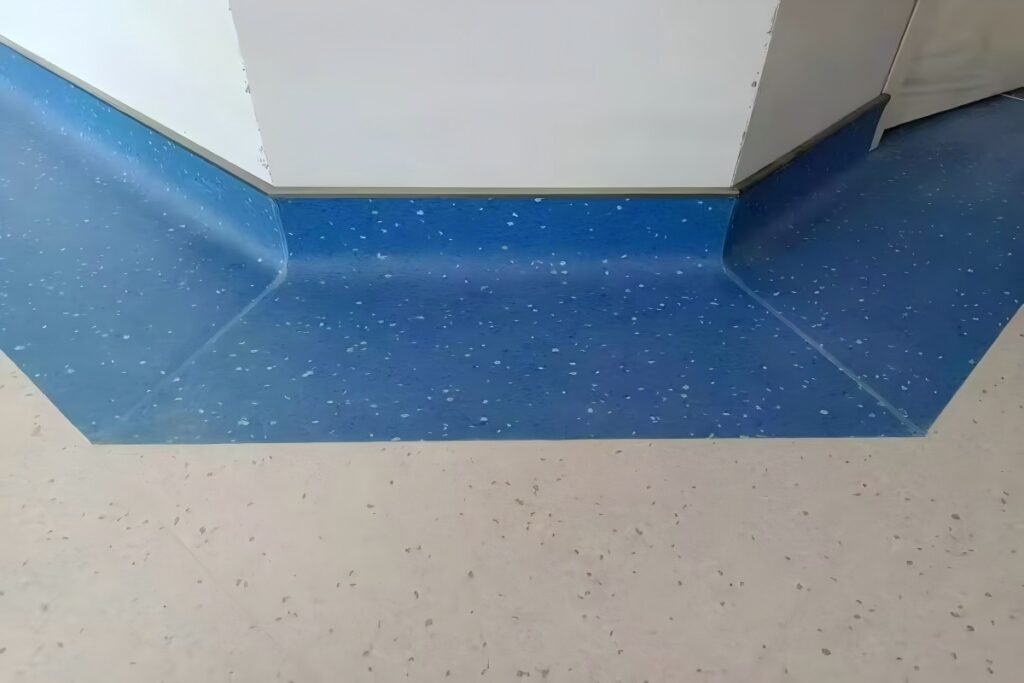 Installation detail of multi-layer commercial PVC flooring