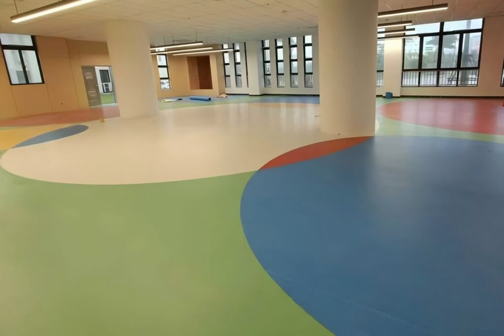 Multi-layer commercial PVC roll flooring installed in public building interior
